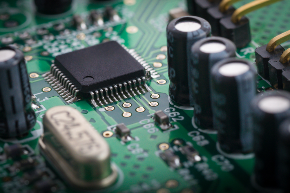 Close-up of a surface mount technology PCB, showcasing intricate electronic components and circuit pathways.